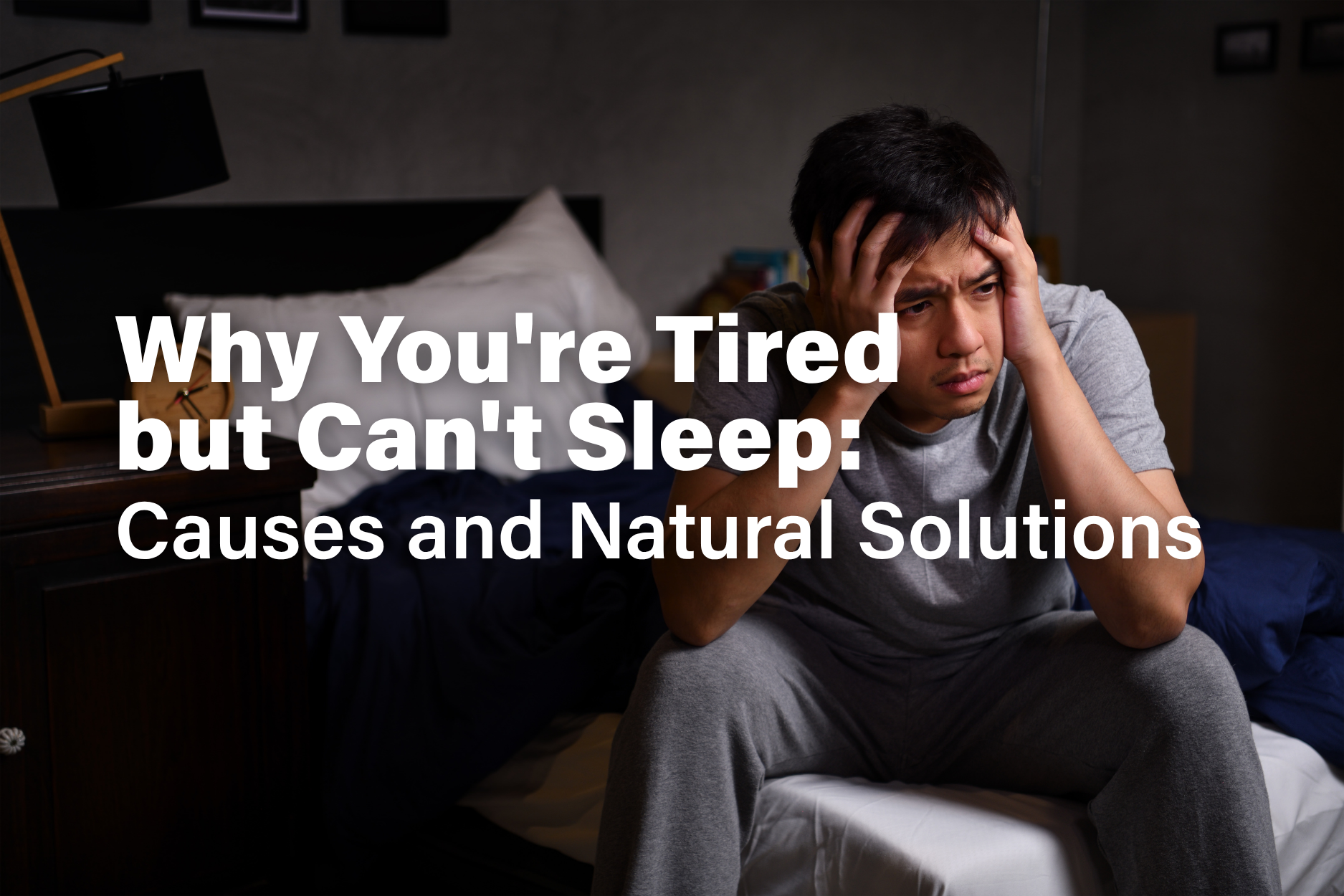 Person feeling exhausted but unable to fall asleep at bedtime. 